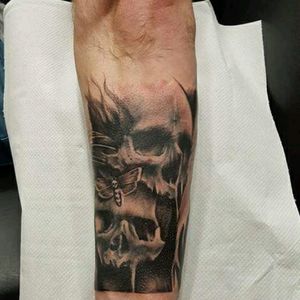 Left arm sleeve. All work done by Karl Stevens of White Flame Tattoo Studio #blackandgrey #skulls #moth #forearmtattoo #whiteflamestudio