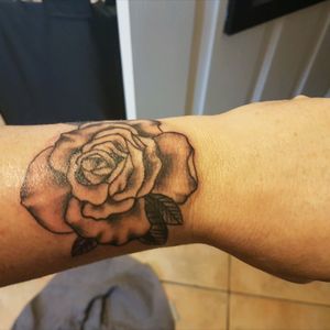 I met an amazing Tattooist in my local area, who tattooed this beautiful black rose on both wrists above and under my wrists to start off my sleeves.