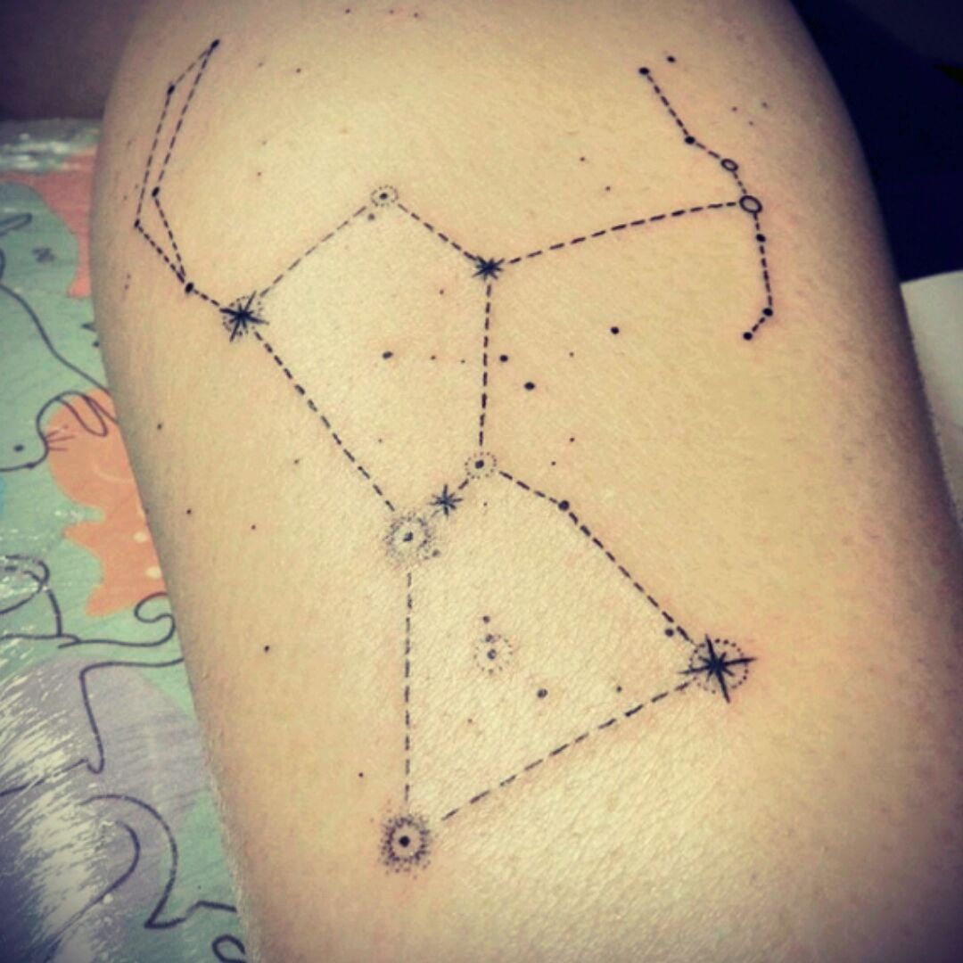 Orions belt tattoo on the left inner arm
