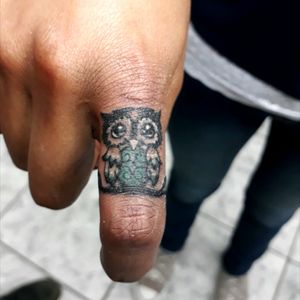 Mini owl tattoo.
