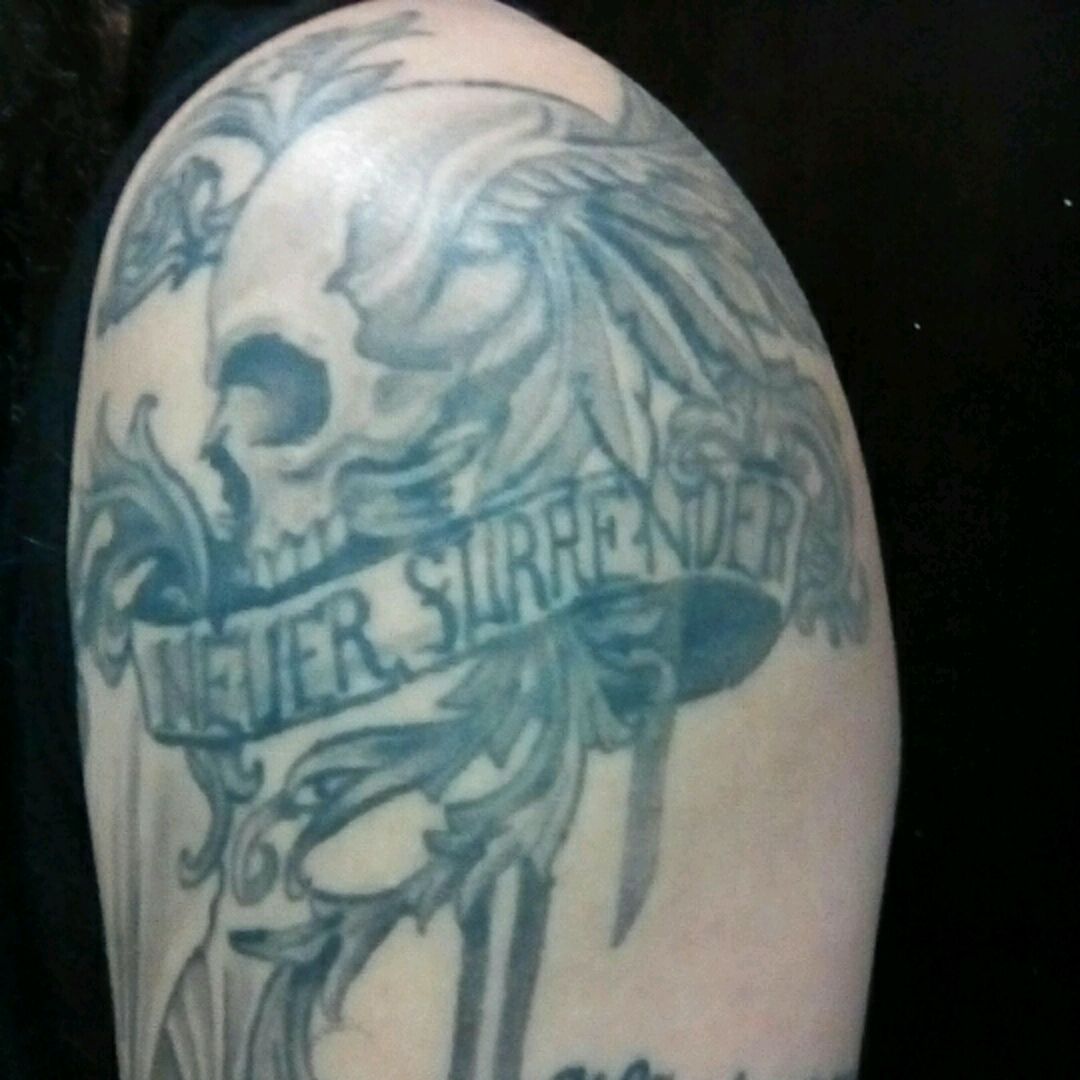 Never Surrender Abstract Tattoo