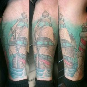 Ship. Boat. Light house. Color tattoo#ship #shiptattoo #pirateship #boat #boattattoo #oldboat #lighthouse #lighthousetattoo #color #colorful #colortattoo #healed #healedtattoo #FullyHealed