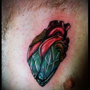 This was my very first tattoo that i got about a year and a half ago and i still love it just as much to this day. #heart #crystal #chest #CrystalHeartTattoo #colortattoo