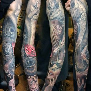Eugen Mahu - Resident Artist #tattoo #tattoos #tattooart #tattooartist #color #colortattoo #realistic #realistictattoo #diamondtattoo #clocktattoo #rosetattoo #rosestattoo #beautifultattoo #ink #inked #inkedup #inklife #armsleeve #art