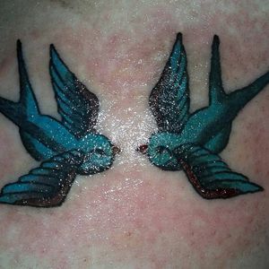 Memorial tattoo for the client of her father's swallows
