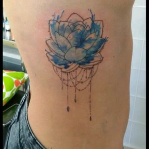 #lotusflower #lotustattoo #blue #lightblue #ornamental #watercolortattoo #watercolor #ribs #ribtattoo #woman #womantattoo