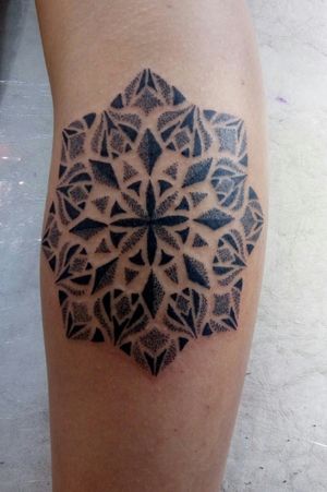 Tattoo by omega ink studio