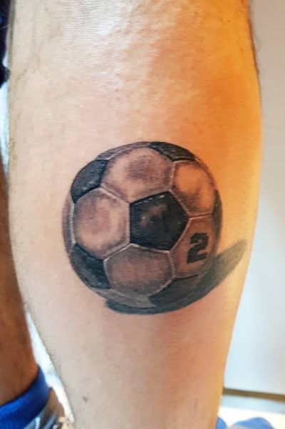soccer ball cross tattoos