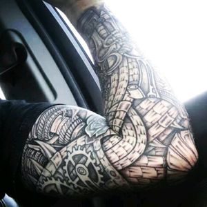 Deejays arm. #tribalmike #adelaide #tattooist #biomechanicaltattoo #biomech #gearbox #tattoo #armtattoo #australianartist #BlackandGreyTattooing #sleevetattoo