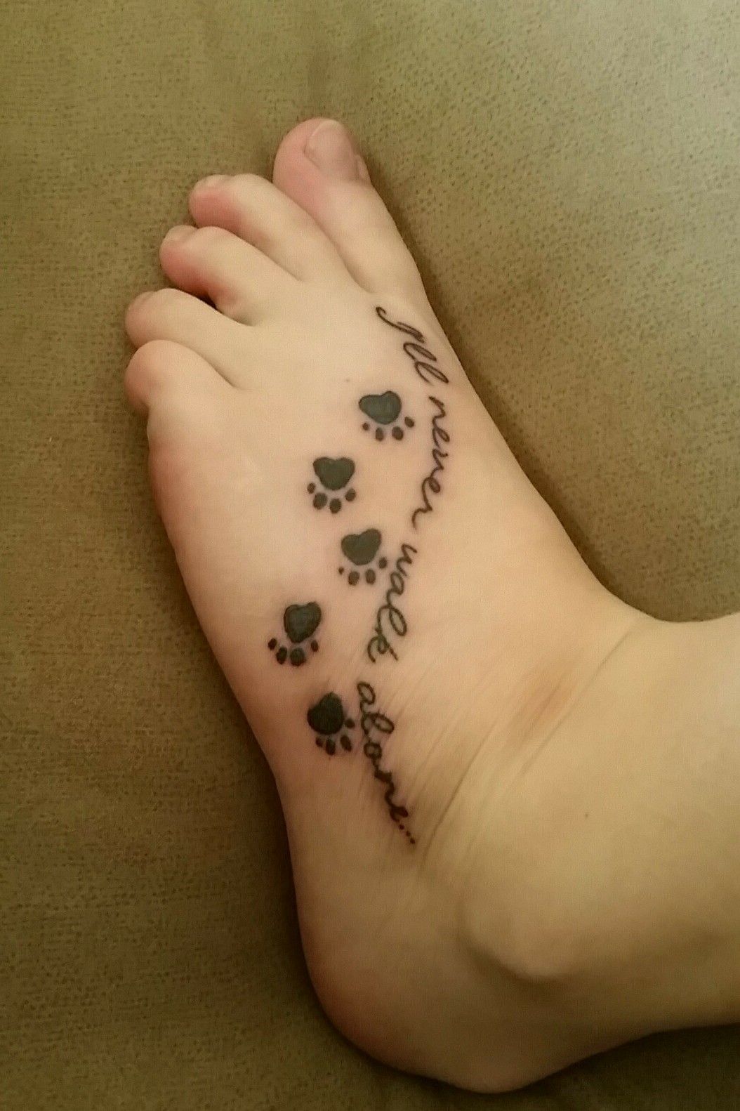 Tattoo Uploaded By Kate I Ll Never Walk Alone Illneverwalkalone Pawprinttattoo Pawprints Foot Tattoodo