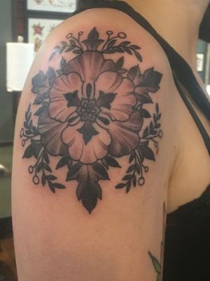 A Flash Day tattoo by Nora at Scapegoat Tattoo in Portland, OR. She does incredible fine detail work. #flowertattoo #detailed #geometrictattoo #geometricflower #blackandgrey 