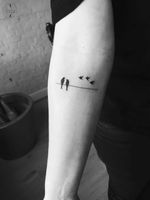 Minimal bird tattoo