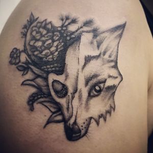 My first tattoo is a half fox half skull with foliage, incorporating a pinecone and acorn which represents my favourite season, autumn. The fox itself denotes not only my Leicester heritage but also being a fan of the 'foxes' - Leicester City! 