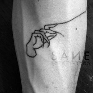 Sinester Hand..Poke tattoo
