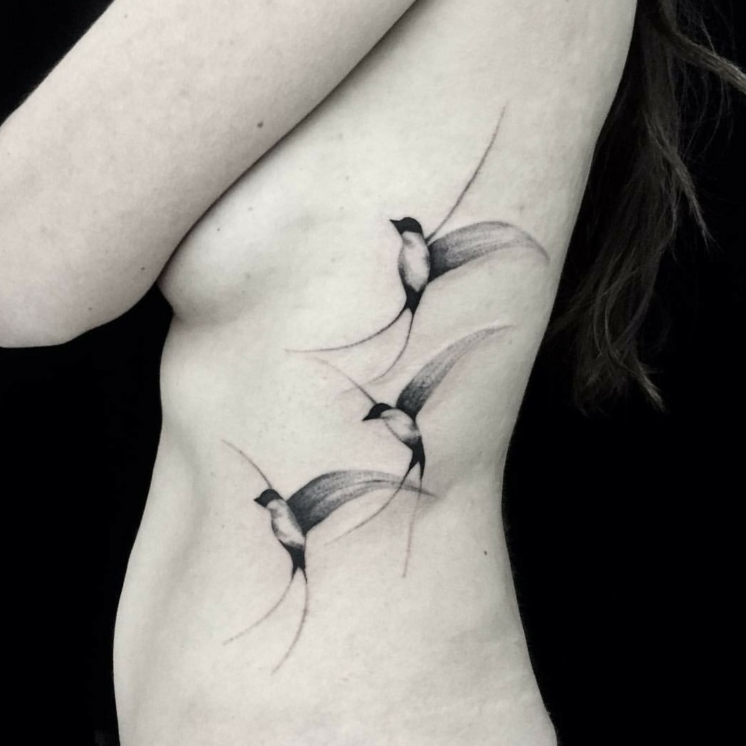 swallows in flight tattoo