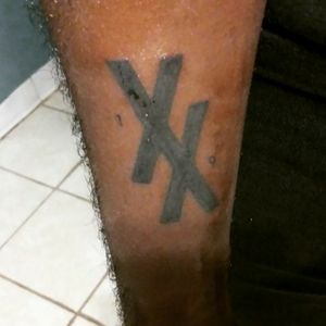 19XX Tattoo on Right Forearm