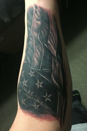 Wavey America flag tattoo 