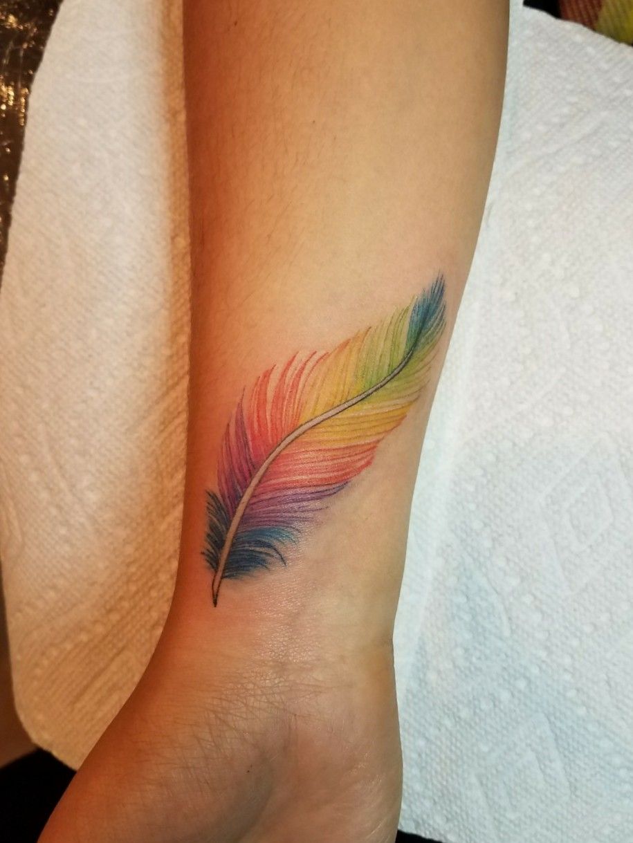 Tattoo uploaded by Erik Portillo  Rainbow feather tattoo  Tattoodo