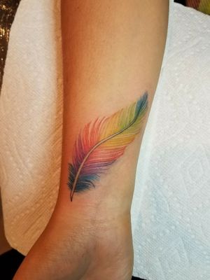 Rainbow feather tattoo 