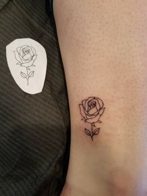 Tiny rose tattoo