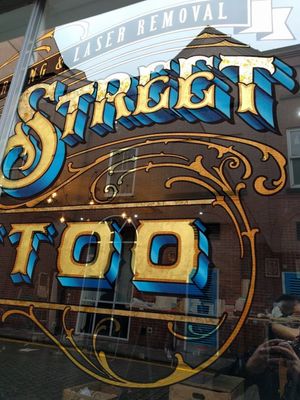 Gold leaf tattoo sign for Queen Street Tattoo by Paul Banks