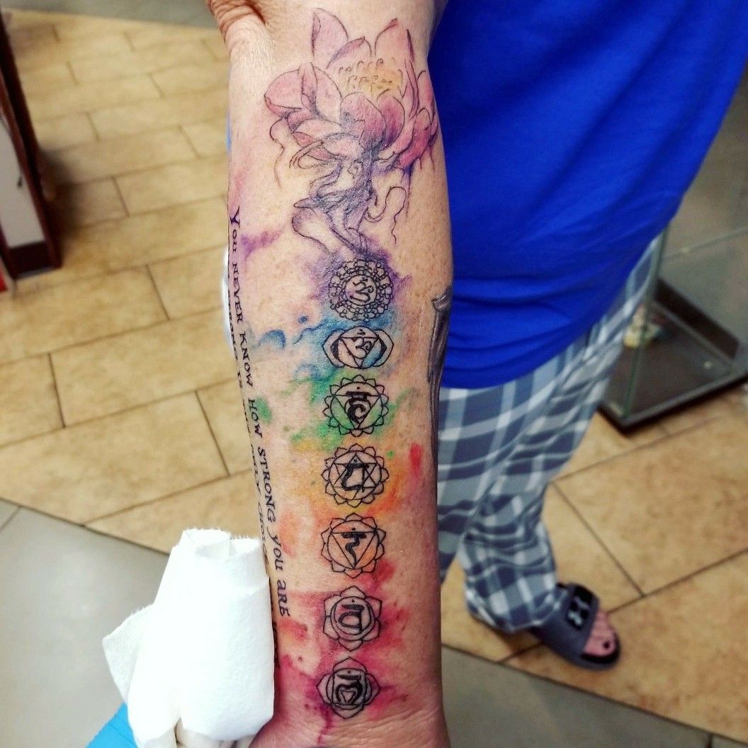 chakra tattoo arm