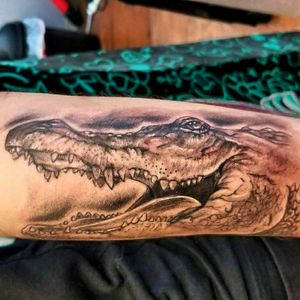 Realistic croc tattoo