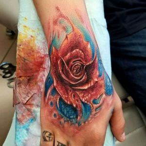 Bio organic rose hand tattoo