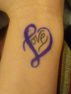 My first and only tattoo. The purple is faded a lot. I colored over it so you can see what it looks like. #love #wristtattoo 