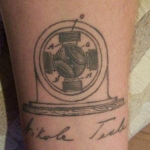 Nikola Tesla tattoo - blueprint of an electric magnetic motor designed by Tesla, as well as his signature is underneath the blueprint