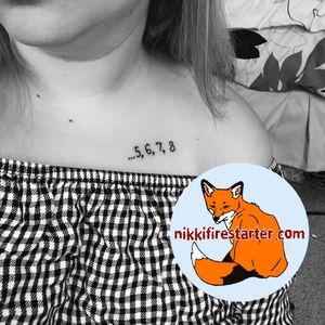 Small tattoo on collarbone. I forgot to take a picture of this one, so luckily she was awesome and sent one to me later! :^)http://nikkifirestarter.com #minimalisttattoos #smalltattoos #collarbonetattoos #texttattoos #numbertattoos #blacktattoos #blackink #ink #linework #tattoos