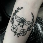 Bee and flowers on forearm