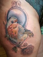 Neo-traditional bird on thigh.