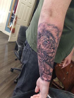 Lion protecting his cub. Tattoo I got yesterday for my little girl #blackandgray #liontattoo #lioncub 