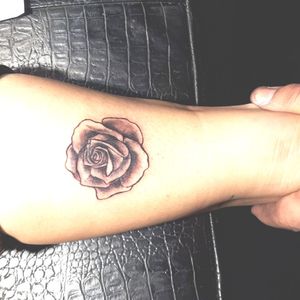 Small rose tattoo 