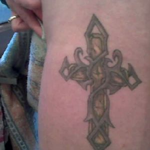 1st tattoo at age 40. By Josh Morgan. My daughter's and my late god daughters crosses combined.
