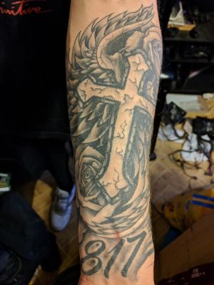 Inner forearm, cross was a cover up work by Dusty Jamieson
