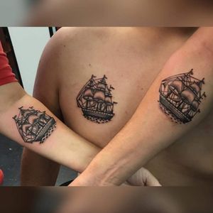 Mother, son, son matching tattoos