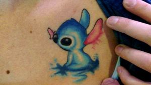 Healed Watercolor Stitch tattoo#healedtattoo #healed #chesttattoo #LiloandStitch #liloandstitchtattoo #stitchtattoo #watercolortattoo #watercolor 