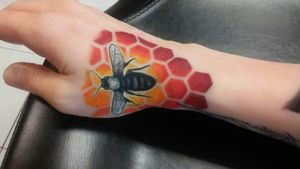 Custom tattoo by resident artist Brittany#tattoo #colortattoo  #color #tattoodesign #geometrictattoo #beetattoo 
