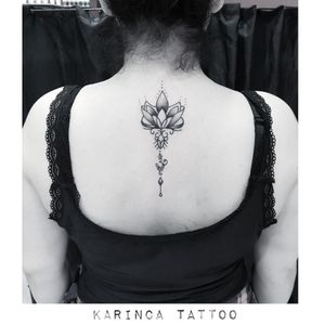 A black lotus piece 🌸Instagram: @karincatattoo #black #lotus #tattoo #tattoos #tattoodesign #tattooartist #tattooer #tattoostudio #tattoolove #tattooart #istanbul #turkey #dövme #dövmeci #design #girl #woman #line #fineline #lotustattoo #backtattoo #ideas #nice #work