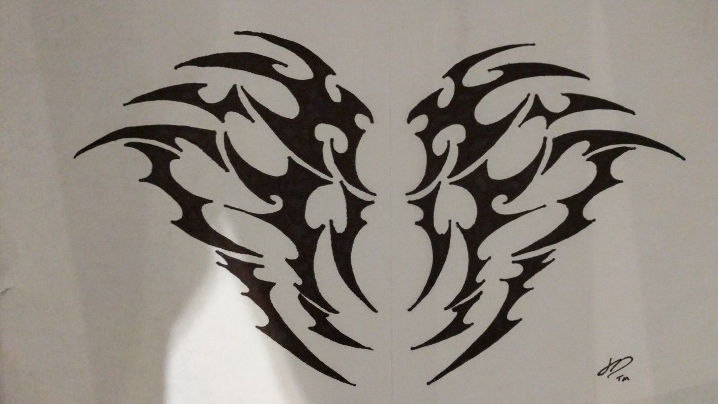 tribal demon wings tattoos