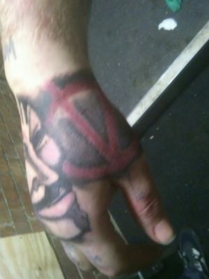 Hand tattoo on Chris 