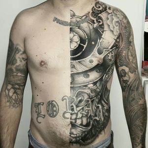 Half torso in some kind of #japanesetattoo mixed with #blackworktattoo style.