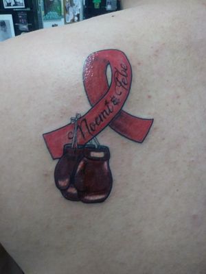 I wanted my first tattoo to be a special so this tattoo was dedicated to my two aunts who had & beat breast cancer
