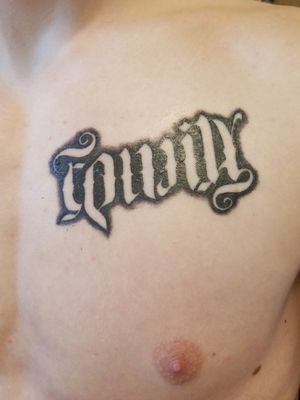 Family and friends. It reads family upright, but upside down it reads friends, and is placed over my heart. 