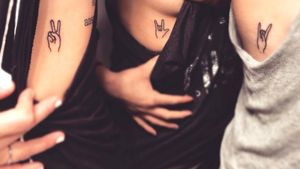 Friend tattoos! #sign #hand #friends #3 #small #cute #peace #love #rock #blackandgrey #yesplease #ribs #sideboob #armpit 