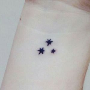 3 little stars, like these. Hand-drawn by myself, my sister and my brother .