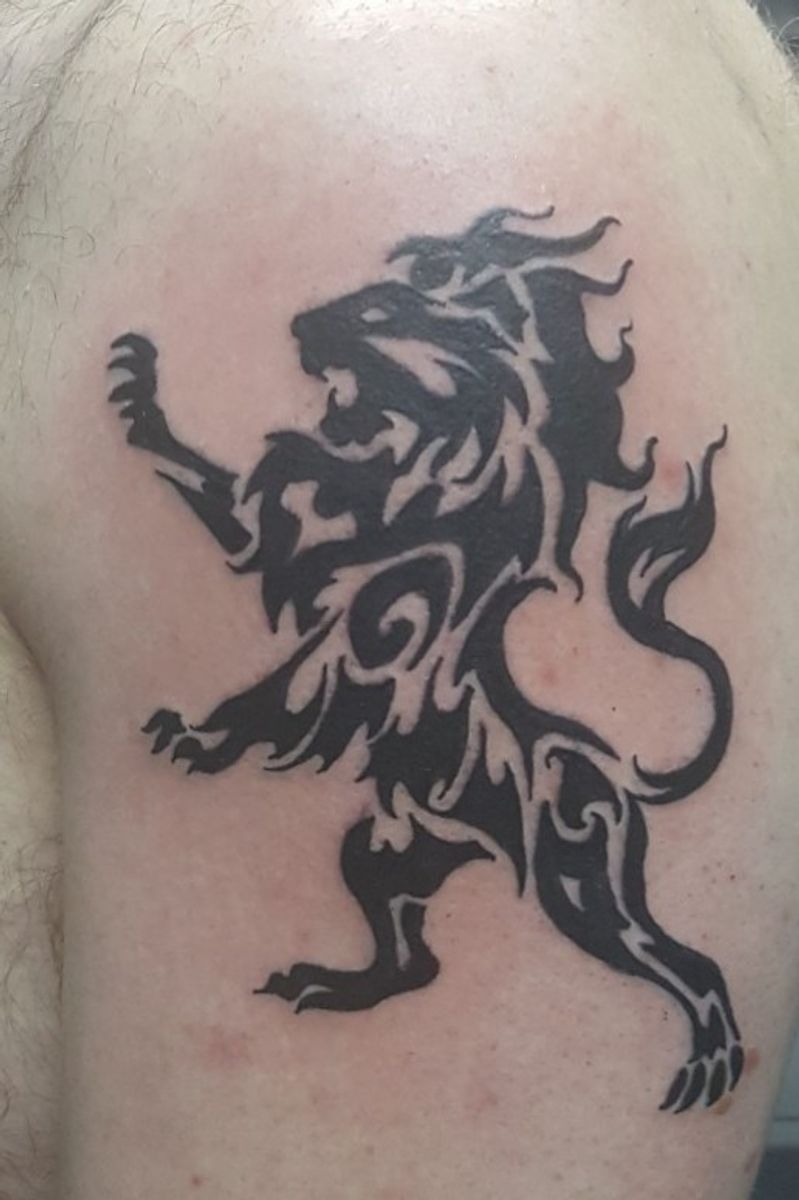 Tattoo uploaded by Aaron • Tribal Lion • Tattoodo