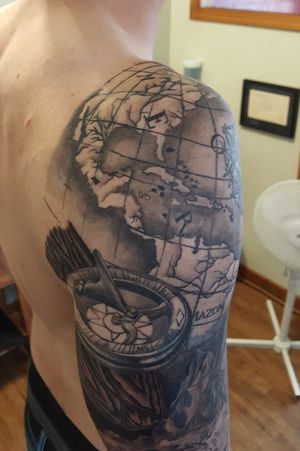 Map with wave and surfboard half-sleeve